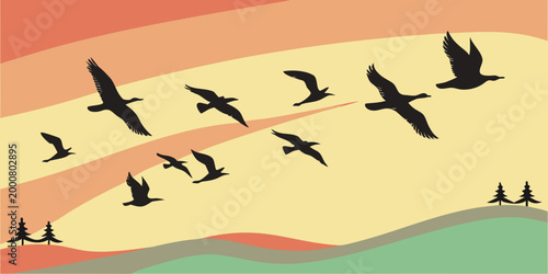 Canvas Print Flock of birds migrating in silhouette over a stylized landscape at sunset with