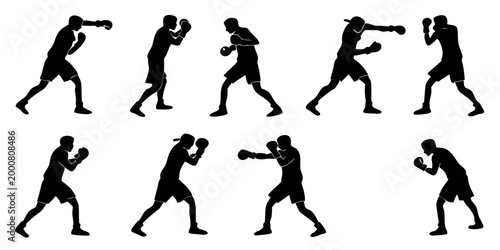 Bild auf Leinwand Professional boxing athlete silhouette poses and fighting techniques with traini