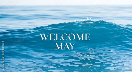 welcome may text on ocean wave