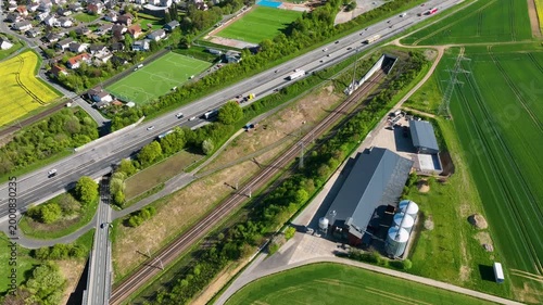 Idstein, Germany - April 23, 2026: Aerial view of German highway A3 and high speed train track between Bad Camberg and Idstein. 