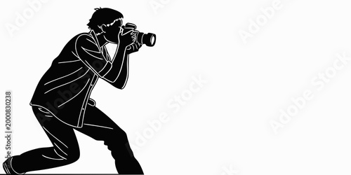 Foto Graphic silhouette of a photographer taking pictures in a crouching position wit