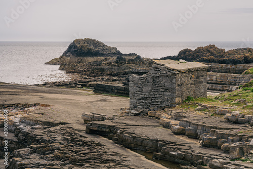 A ruined stone hut on the coast of the Irish Sea in Scarlett, Isle of Man