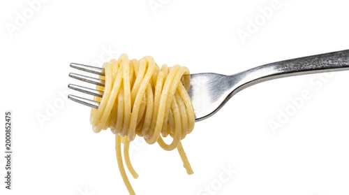 Spaghetti pasta twirled around a metal fork on a white background with italian food main course spaghetti carbohydrate delicious wholesome traditional background isolated homemade restaurant