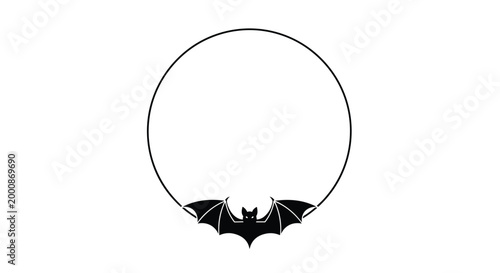 Black silhouette of a flying bat centered at the bottom of a simple thin circular frame for spooky Halloween themes and decorations.