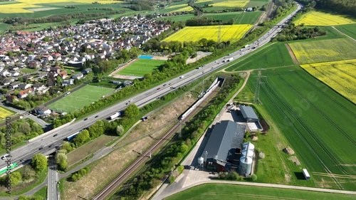 Idstein, Germany - April 23, 2026: Aerial view of German highway A3 and high speed train track between Bad Camberg and Idstein. 
