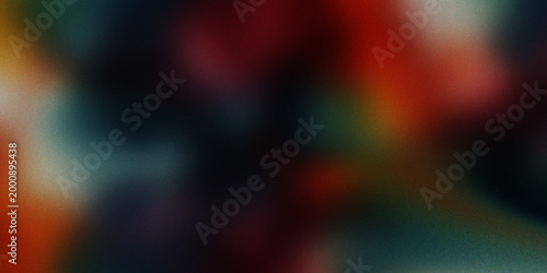 Canvas Print Abstract grainy background with a soft blend of red, green, blue, and orange hues creating a vibrant color spectrum