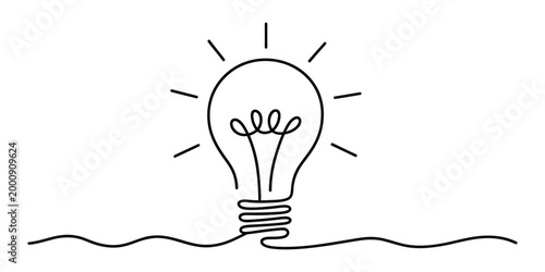 Continuous line drawing of a glowing light bulb icon