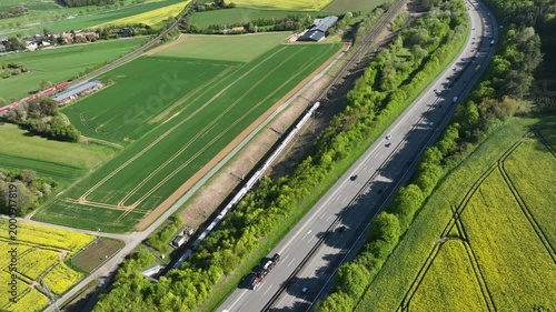 Idstein, Germany - April 23, 2026: Aerial view of German highway A3 and high speed train track between Bad Camberg and Idstein. 