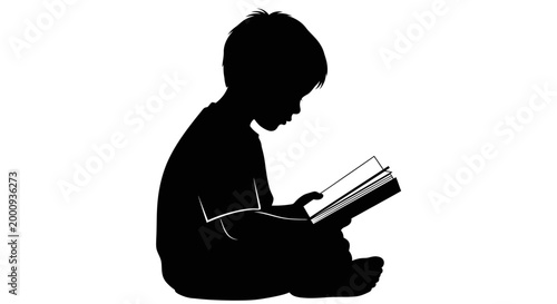 Silhouette of a young boy reading a book isolated on white background.