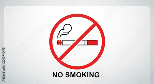 A clear and universally recognized no smoking sign featuring a lit cigarette with smoke crossed out by a red circle and diagonal line, with 'NO SMOKING' text below on a light background.