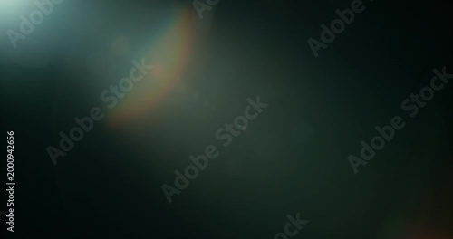 Slow motion cinematic lens flare and light leak effect isolated on black background. Perfect overlay for VFX, transitions, title reveals, film burn style and glow highlights.