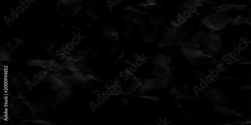 Solid black simple textured paper crumpled background texture Wallpaper banner template for graphic and web design. Chaotic abstract organic design.