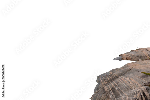 Fotografie Rock with a rough surface and algae at its base, isolated against a transparent background, symbolizing the force of nature, the action of time, the coastal ecosystem, and ecological resilience