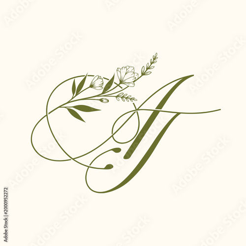 Elegant Calligraphic Letter AT with Botanical Flourish.