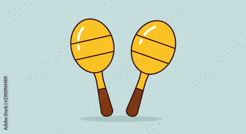 Obraz na płótnie Cartoon illustration of a pair of yellow maracas on a light blue background