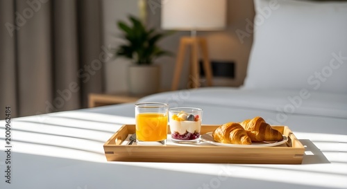 Breakfast in bed a luxurious morning with pastries and orange juice