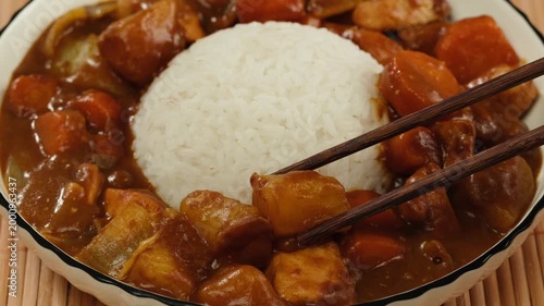 Japanese curry rice with fry pork Tonkatsu, Katsu Kare, Japanese breaded cooking dinner in restaurant, close up macro of asian food. 
