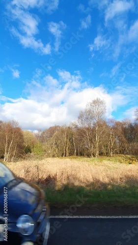 Scottish Rural Country road Hills Near Glasgow Scotland. Car Mounted Camera Footage During Drive Through Rural Area.