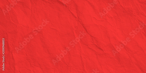 bright red textured paper background with subtle crumpled fiber ripples and elegant grainy craft parchment surface. vibrant red textured background featuring organic, subtle crumpled patterns
