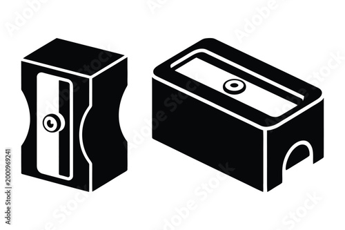 Two pencil sharpeners, one black plastic and one metal grinding sharpener