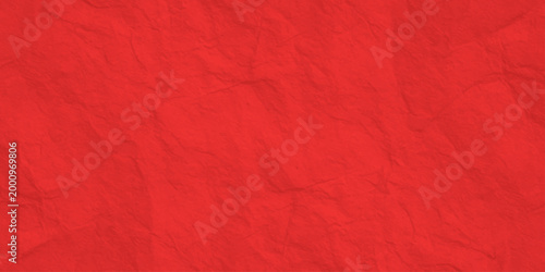 bright red textured paper background with subtle crumpled fiber ripples and elegant grainy craft parchment surface. vibrant red textured background featuring organic, subtle crumpled patterns