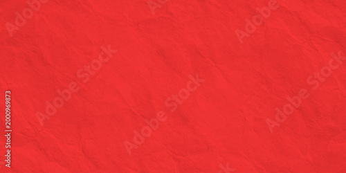 bright red textured paper background with subtle crumpled fiber ripples and elegant grainy craft parchment surface. vibrant red textured background featuring organic, subtle crumpled patterns