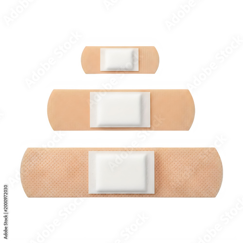 Three beige bandages stacked on top of each other isolated on transparent background