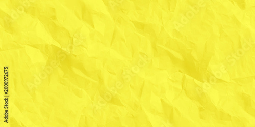 Crumpled yellow paper texture background, vibrant wrinkled parchment surface for copy space. high-quality, macro shot of a vibrant yellow crumpled paper surface.