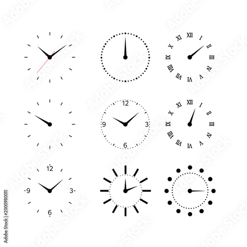 Foto A collection of various analog clocks with different designs and times displayed