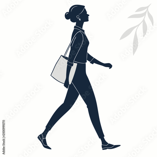 Silhouette of a woman walking carrying a tote bag with silhouette, shopping