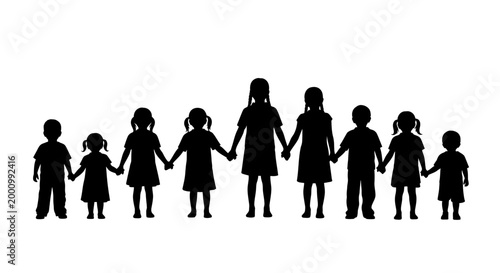 Silhouette of a diverse group of children holding hands together.