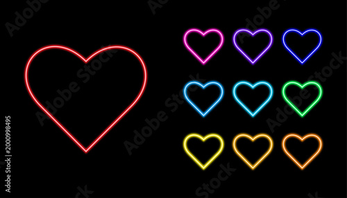 a collection of vibrant neon heart outlines in various colorful shades glowing brightly on a dark background, representing love and romance as a digital design element.