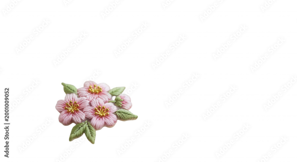 Obraz premium Delicate pink embroidered flowers with green leaves on black background, floral embroidery