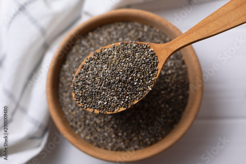 chia seeds on a color background. Useful supplements, super food, healthy food, veggie
