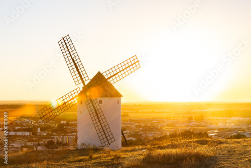 Windmill on a hill at Mota del Cuervo with golden sunset light