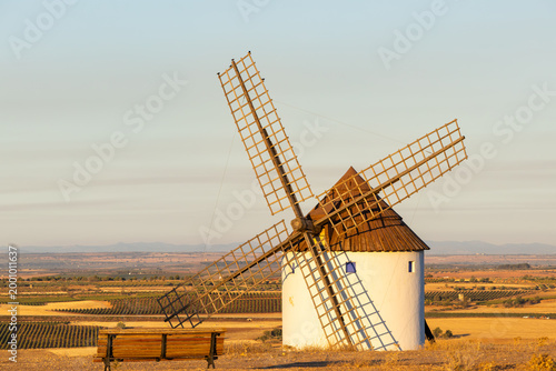 Traditional Spanish windmill standing over La Mancha landscape