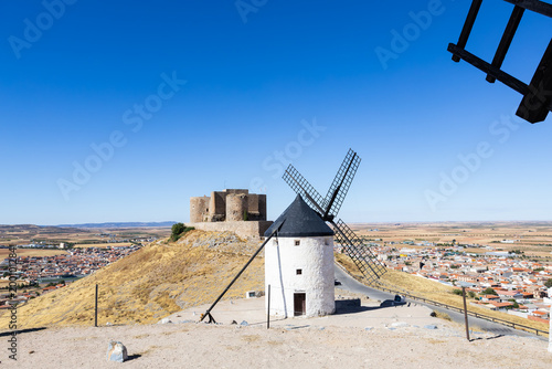 Consuegra castle and windmills dotting La Mancha landscape