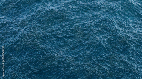 Vibrant cyan blue water ripples background for summer vacation branding and tropical sea surface wave texture 8k high resolution crisp detail no text
