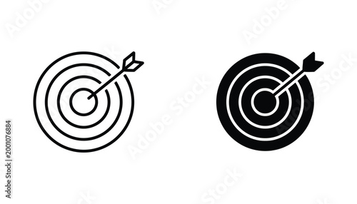 Simple outline and solid black icon of a target with an arrow hitting the bullseye representing goals and success