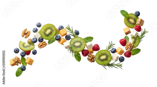 Healthy snack ingredients, including kiwi, blueberries, raspberries, walnuts, cheese, mint, and rosemary, arranged in a flowing pattern, isolated on transparent background