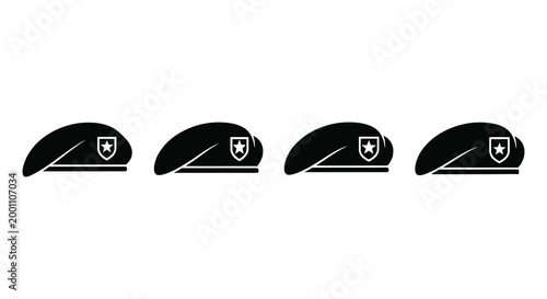 Four black berets with insignia displayed in a flat silhouette