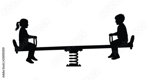 Children playing on a seesaw silhouette a moment of balance and childhood joy