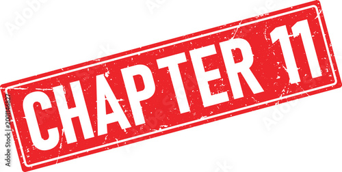 Red distressed rubber stamp with white text CHAPTER 11 displayed in a rectangular shape