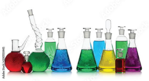 Collection of assorted laboratory glassware filled with colorful liquids flasks beakers vials lab equipment laboratory glassware colorful