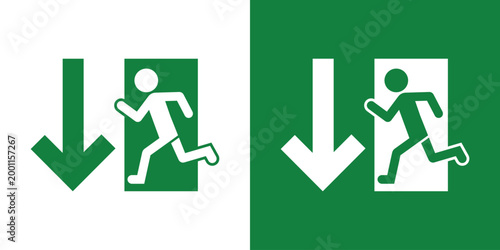 Emergency evacuation sign with a running person and a downward arrow. Essential vector icon for directing traffic toward exits in public buildings. Professional green and white flat design.