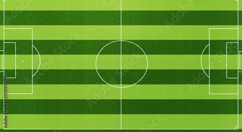 Aerial view of a soccer field with green stripes and white markings