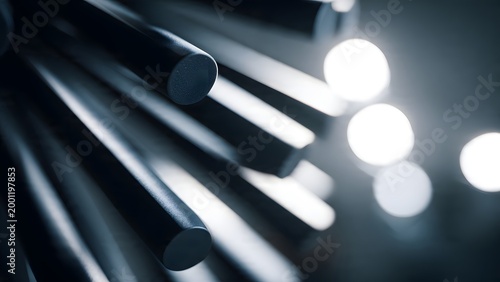 An abstract minimalist closeup of dark cylindrical architectural elements with soft round glowing bokeh lights in a sophisticated professional blue and grey atmospheric setting.