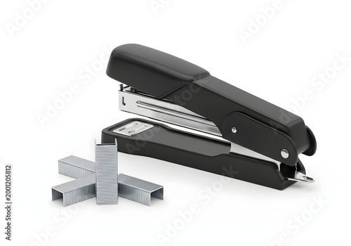 A practical black stapler rests beside unfastened metal staples, signifying efficient document organization and effective office supplies for administrative tasks