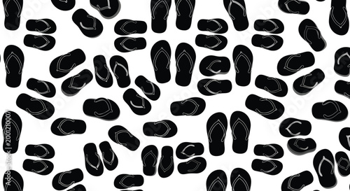 A collection of black pills scattered on a surface
