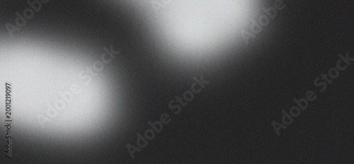 Abstract textured background with soft light gradients and grainy texture in monochrome tones creating a subtle atmospheric effect